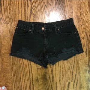 Grey distressed Levi’s jean shorts